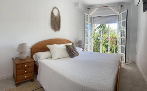 Apartamento con diseño, jardín privado, piscina comunitaria y acceso directo playa arenal by homeprive