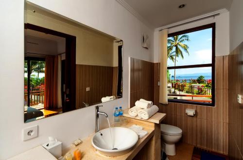 Koupelna v ubytování Orlowsky Discovery Candidasa Hotel