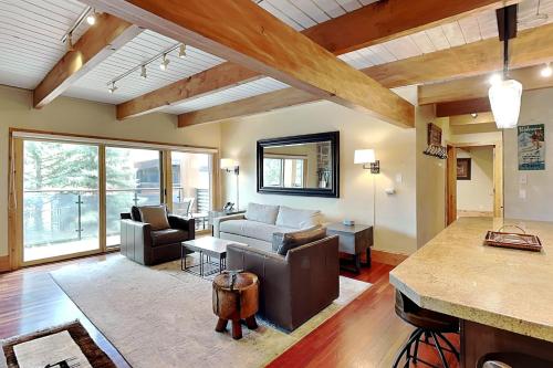 a living room with a couch and a table at Timberline Condominiums 2 Bedroom Deluxe Unit D2D in Snowmass Village