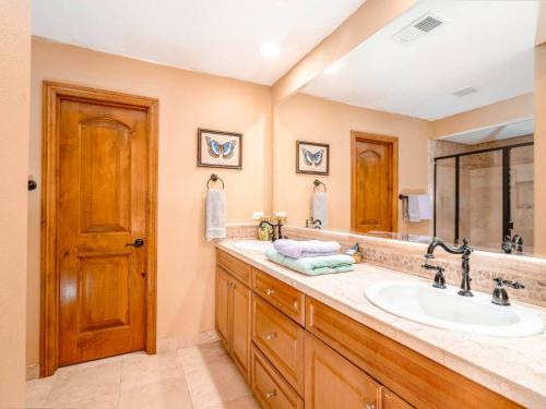 a bathroom with a sink and a mirror at Condo 40-4 El Dorado Ranch in San Felipe