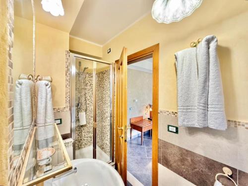 a bathroom with a shower and a sink at Antico Borgo Petralia in Zafferana Etnea