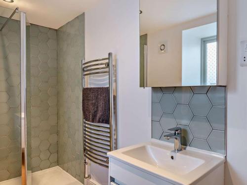 a bathroom with a sink and a shower at 2 Bed in Settle oc-g0051 in Settle