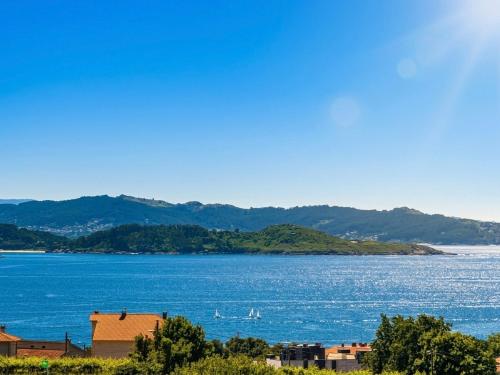 a view of a large body of water with boats in it at La Pepa Sanxenxo in Sanxenxo