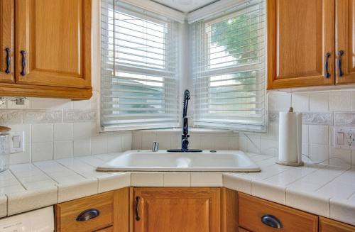 a kitchen counter with a sink and a window at Welcome To Riverside - Spacious, Cozy, Central in Riverside