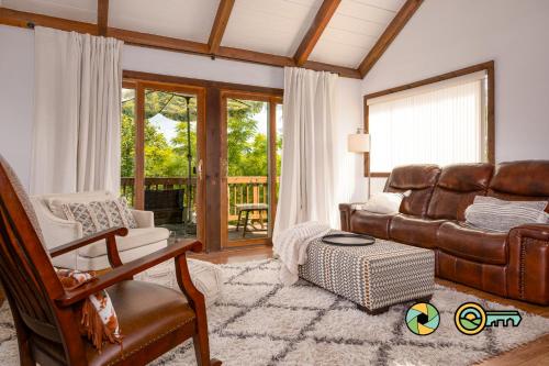 a living room with a couch and a chair at The Hill T-19: Eagle's Nest in Basye