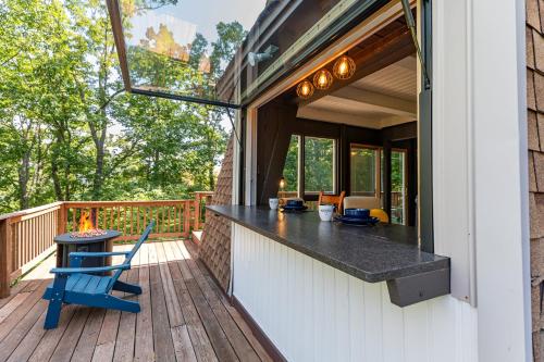 a porch with a bar on a deck at 1186 Fairway Drive: Country Squire in Basye
