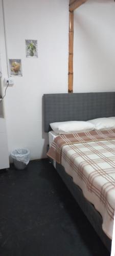 a bedroom with a bed in a room at casa posada paracas in Paracas