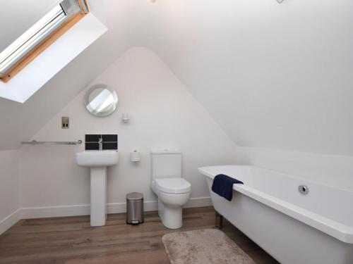 a white bathroom with a sink and a toilet at 2 Bed in Lamesley oc-cn107 in Lamesley