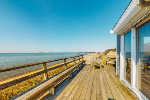a deck with a view of the ocean at Beaches n' Sunsets in Eastham