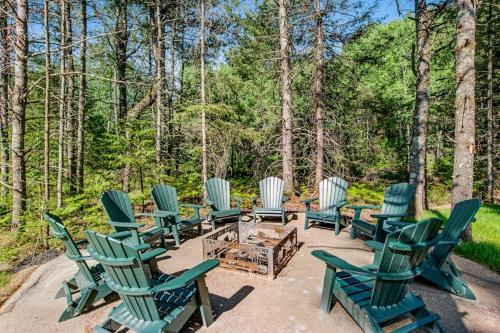 a group of chairs sitting on a patio at The Woodland in Conover