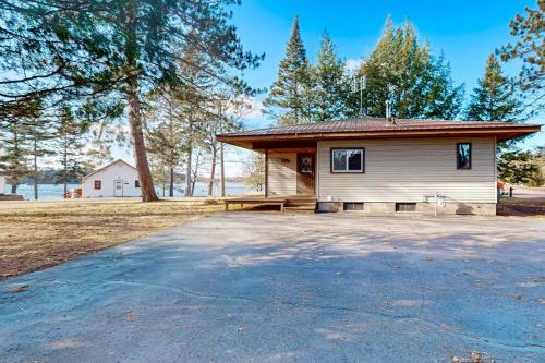 a house with a picnic table in front of it at The Trail Hub in Mercer