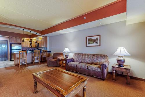 a living room with a couch and a table at Chula Vista Condo #2402 in Wisconsin Dells