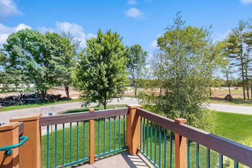 a balcony with a wooden fence and trees at Chula Vista Resort Villa # 7212 in Wisconsin Dells