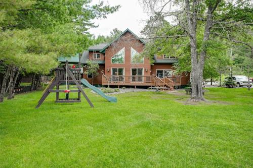 a playground in a yard in front of a house at Island View I in Eagle River