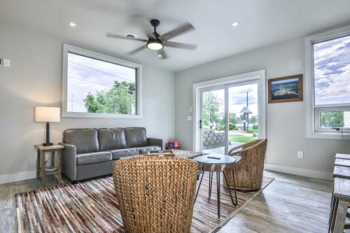 a living room with a couch and a table and chairs at The Studio in Minocqua