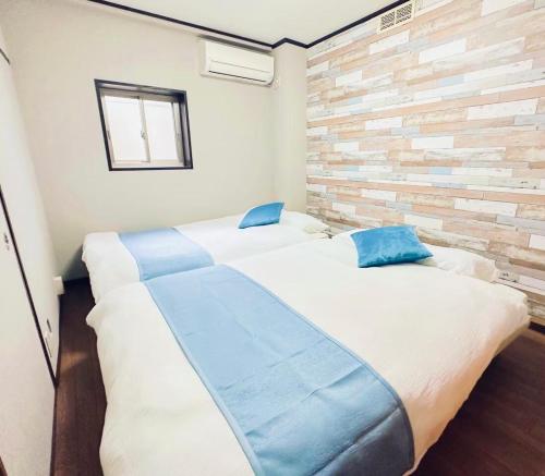 Guest House HAMAYA 大国町駅から1分,難波駅まで1駅2分の好立地