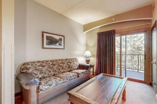 a living room with a couch and a table at Chula Vista Condo Unit 2647 in Wisconsin Dells