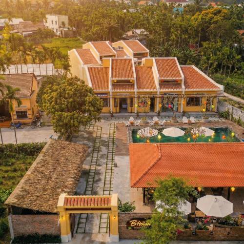 an aerial view of a house with a swimming pool at B'Hoian Retreat in Hoi An