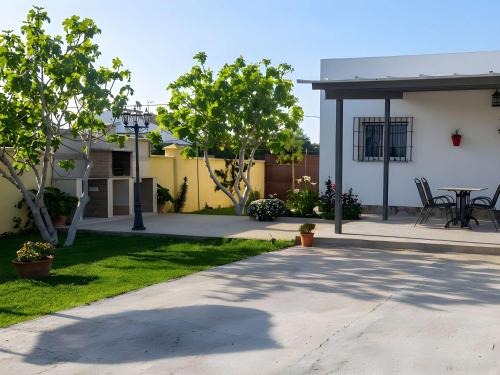 Casa con jardin privado y zona de barbacoa