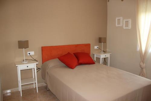 En eller flere senge i et værelse på Villas Los Olivares - Deniasol