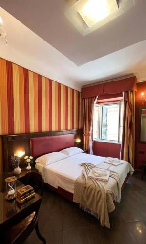 Кровать или кровати в номере Smart Station Hotel