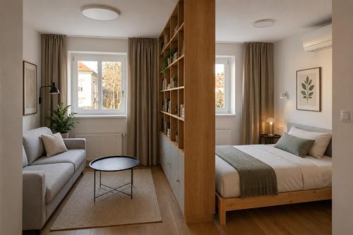a bedroom with a bed and a book shelf at Villa Šanca in Bratislava