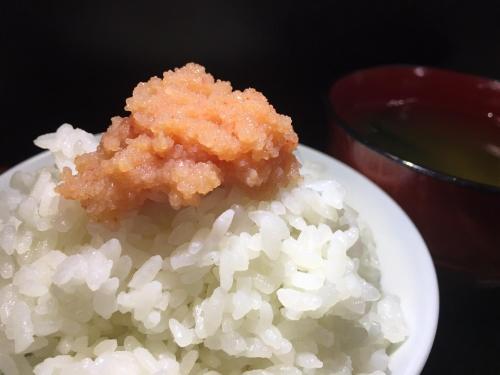 a plate of rice with a piece of food on it at Hotel Crown Hills Kokura in Kitakyushu