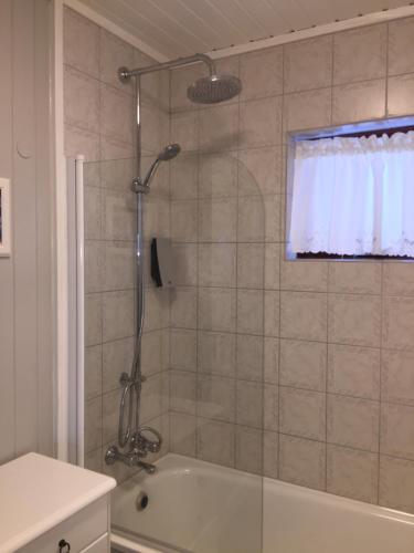 Koupelna v ubytování Brekkugisting Villa