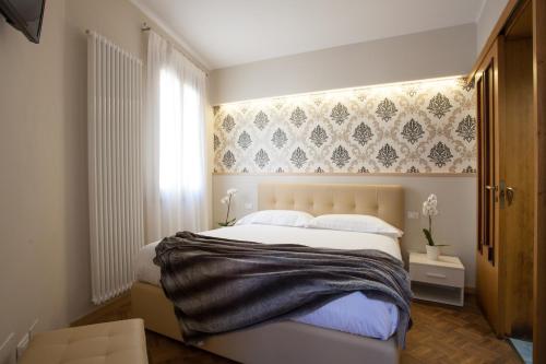 Ένα ή περισσότερα κρεβάτια σε δωμάτιο στο Residence "Le Casette"