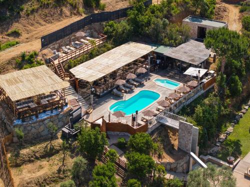 an aerial view of a house with a swimming pool at Résidence Aigue Marine in Coti-Chiavari