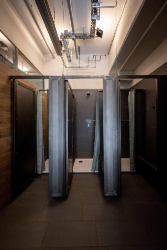 a hallway with glass doors in a room with at Das Boot Triberg in Triberg