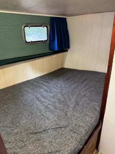 a small bed in the back of an rv at Das Boot Triberg in Triberg