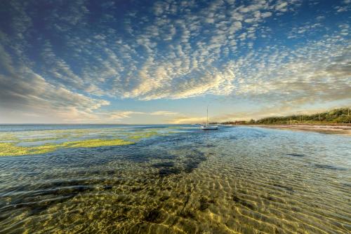 Ein Strand an oder in der Nähe der Ferienwohnung