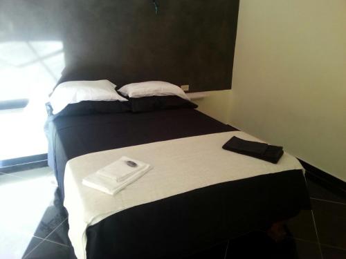 Katil atau katil-katil dalam bilik di B&B Le Villette Las Lajas