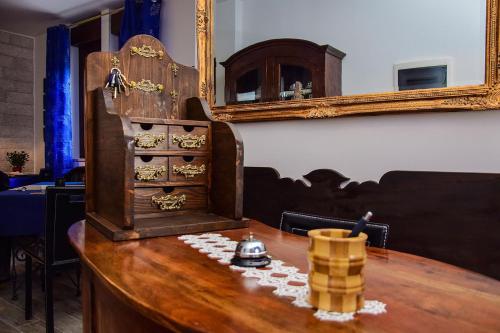 a wooden table with a mirror on top of it at Albadido in Campomarino