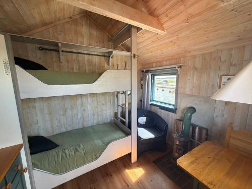 an overhead view of a tiny house with a bunk bed at Horns Skärgårdscamping in Nyköping