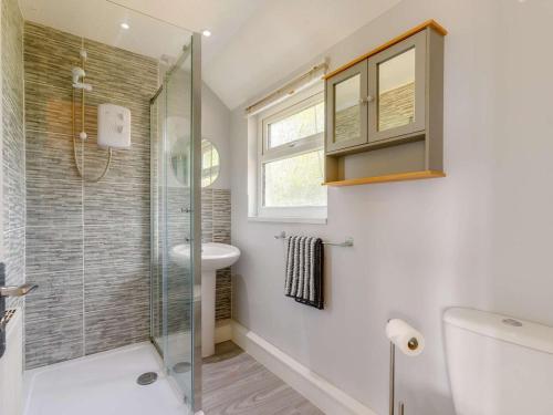 a bathroom with a shower and a sink at 1 Bed in Cinderford oc-88271 in Cinderford