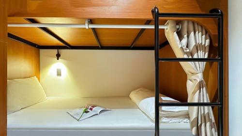 a bunk bed room with two bunk beds in it at Seaforest Hotel by Haviland in Danang