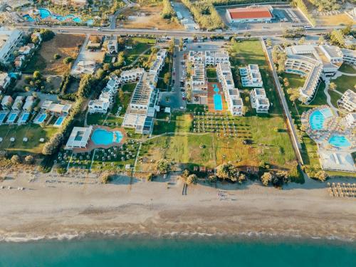 an aerial view of a resort on the beach at Geraniotis Hotel and Resort in Platanias