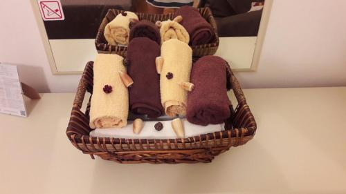 a basket filled with stuffed animals on a table at Rooms Radic in Dubrovnik