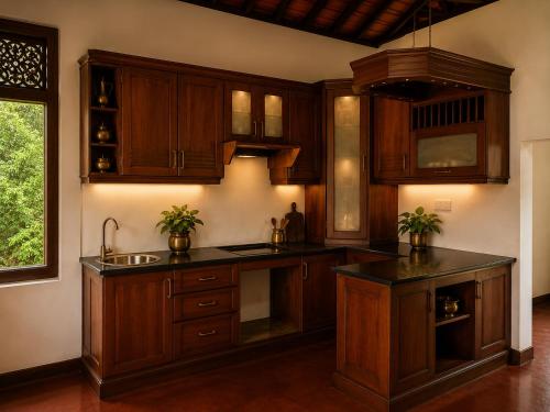 a kitchen with wooden cabinets and a sink at Basnagoda Walawwa in Ruwanwella