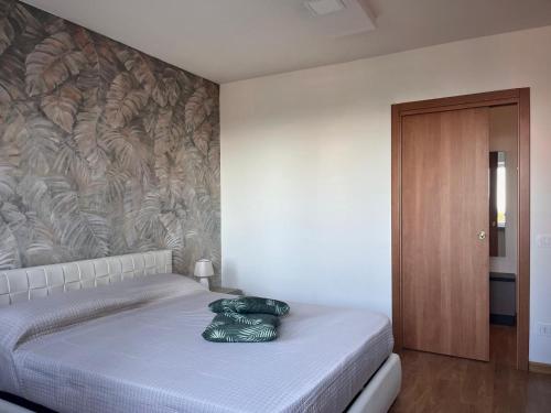 a bed with a pillow on it in a bedroom at Casa Araiani in Ariano Irpino