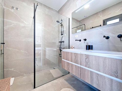 a bathroom with a shower and a sink at Casa Colisa - 8610 in San Javier