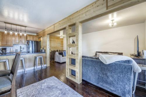 a kitchen and living room with a couch in a room at Orion Ridge Retreat in Stateline