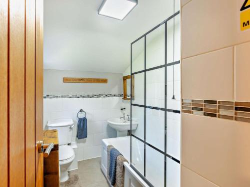 a bathroom with a toilet and a sink at 2 Bed in Morpeth oc-cn049 in Acklington