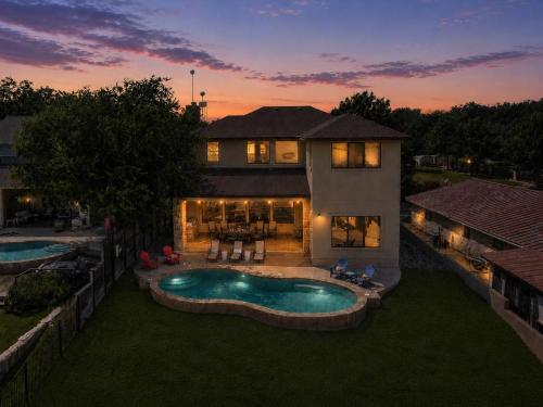 an aerial view of a house with a swimming pool at 119 Christopher Concierge Services Available in Kingsland