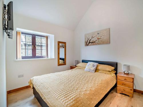a bedroom with a bed and a window at 2 Bed in Bristol oc-72837 in Chew Magna
