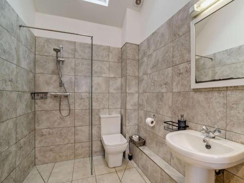 a bathroom with a shower and a toilet and a sink at 2 Bed in Bristol oc-72837 in Chew Magna