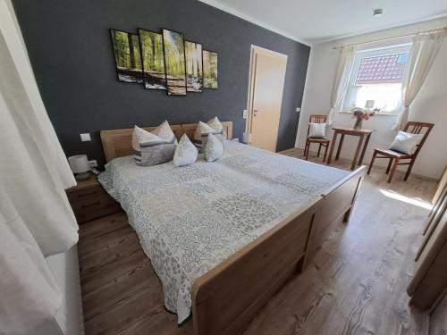 a bedroom with a large bed in a room at Ferienhaus zum Eiskeller in Stadt Wehlen