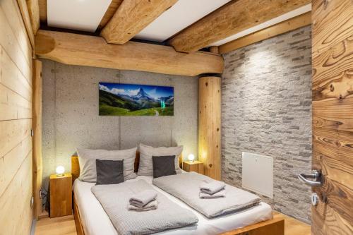 a bedroom with two beds in a room at Chalet Weiss in Wörgl